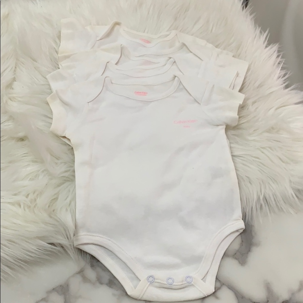 Calvin Klein Baby Onesies 4 pc. Set